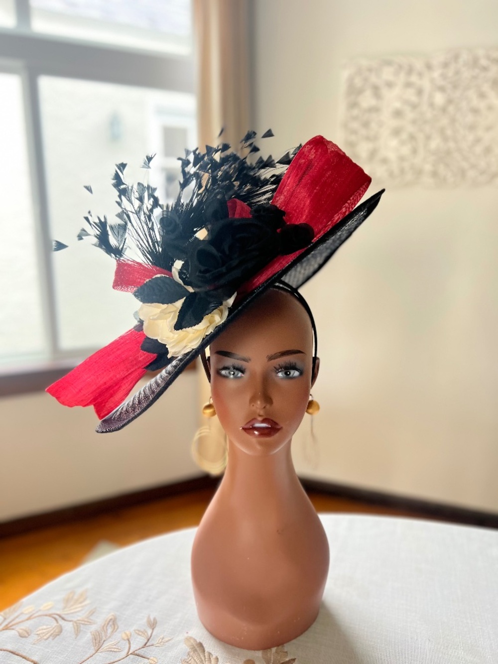 Black sinamay hat Fascinator with fire engine red abaca silk oversized bow